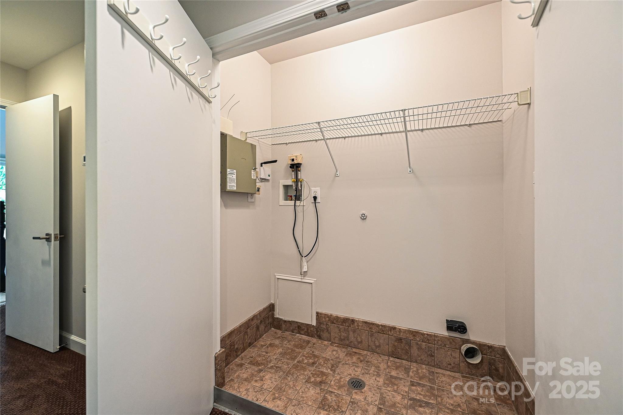333 West 7th Street Charlotte, NC 28202 - Photo 24 of 46 a bathroom with a glass shower door