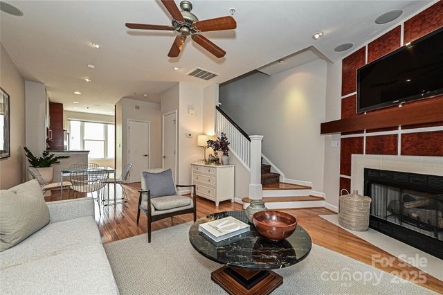 a room with furniture and a flat screen tv