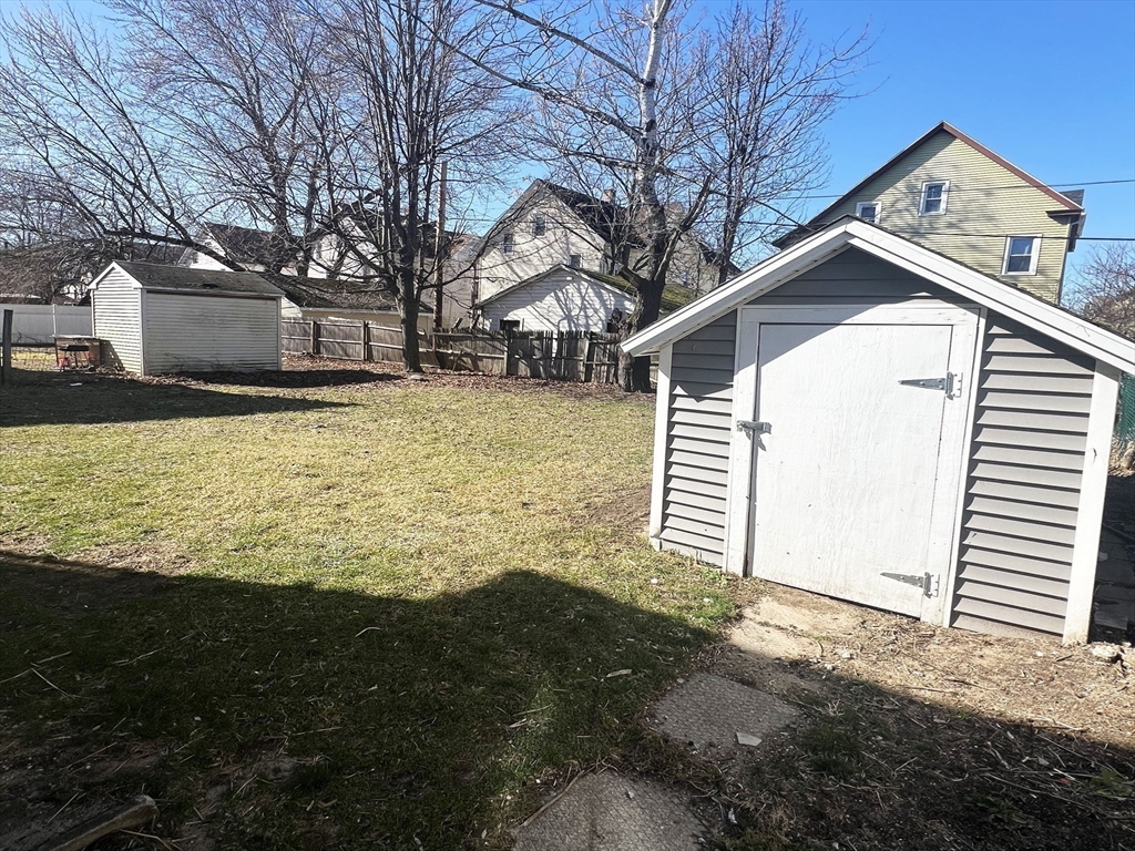 24 Wareham Street Springfield, MA 01108 - Photo 15 of 16 a view of a house with a yard
