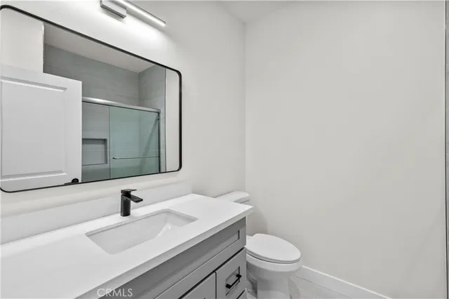 a bathroom with a sink and a toilet