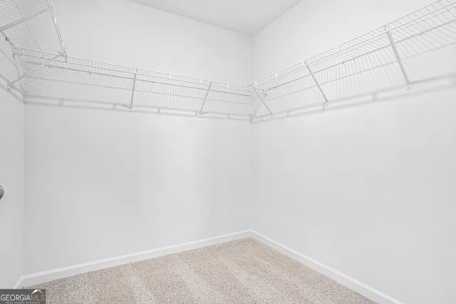 a view of a room with racks on the wall