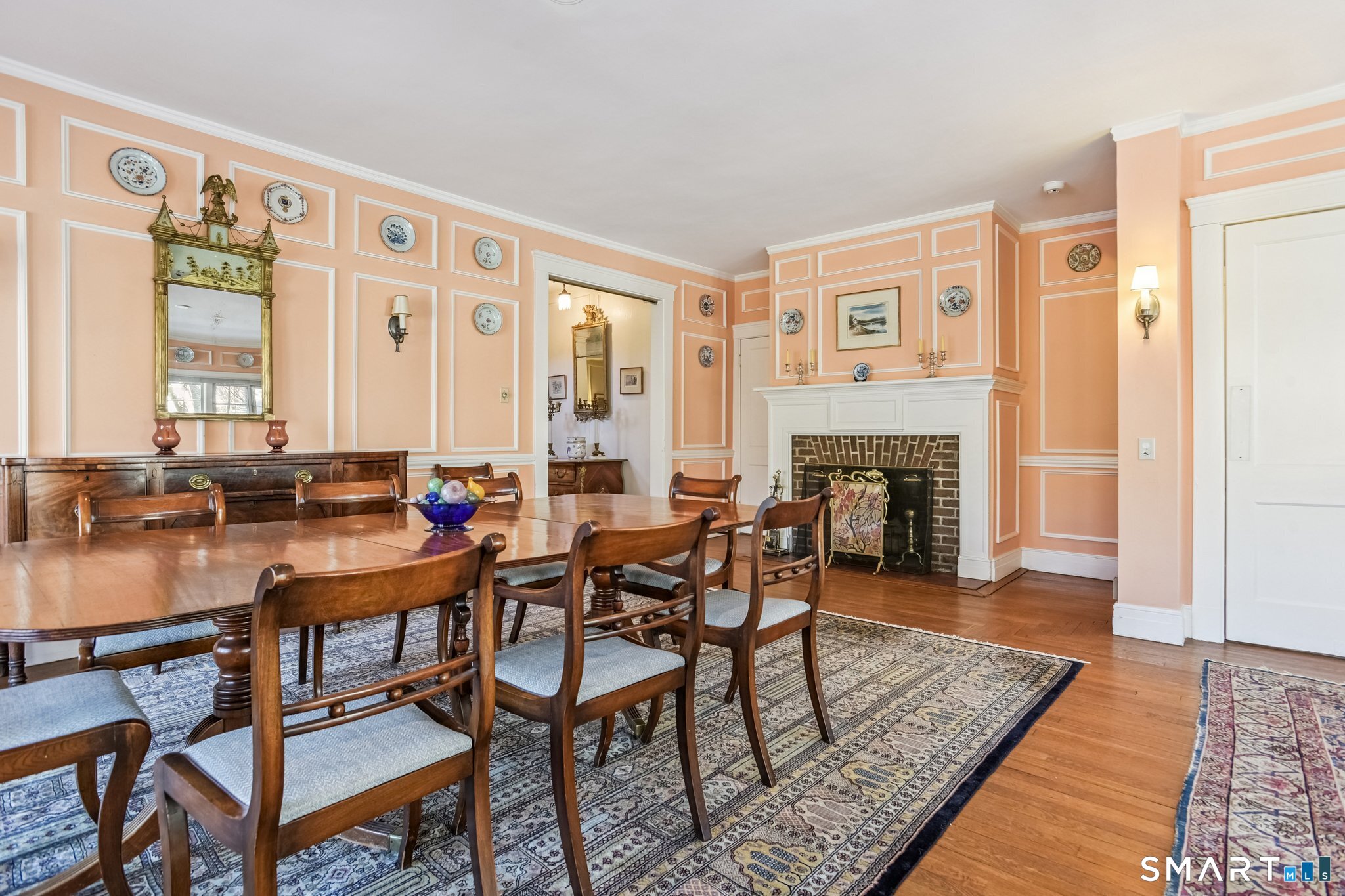 1050 Whitney Avenue Hamden, CT 06517 - Photo 20 of 40 a dining room with furniture a rug and wooden floor