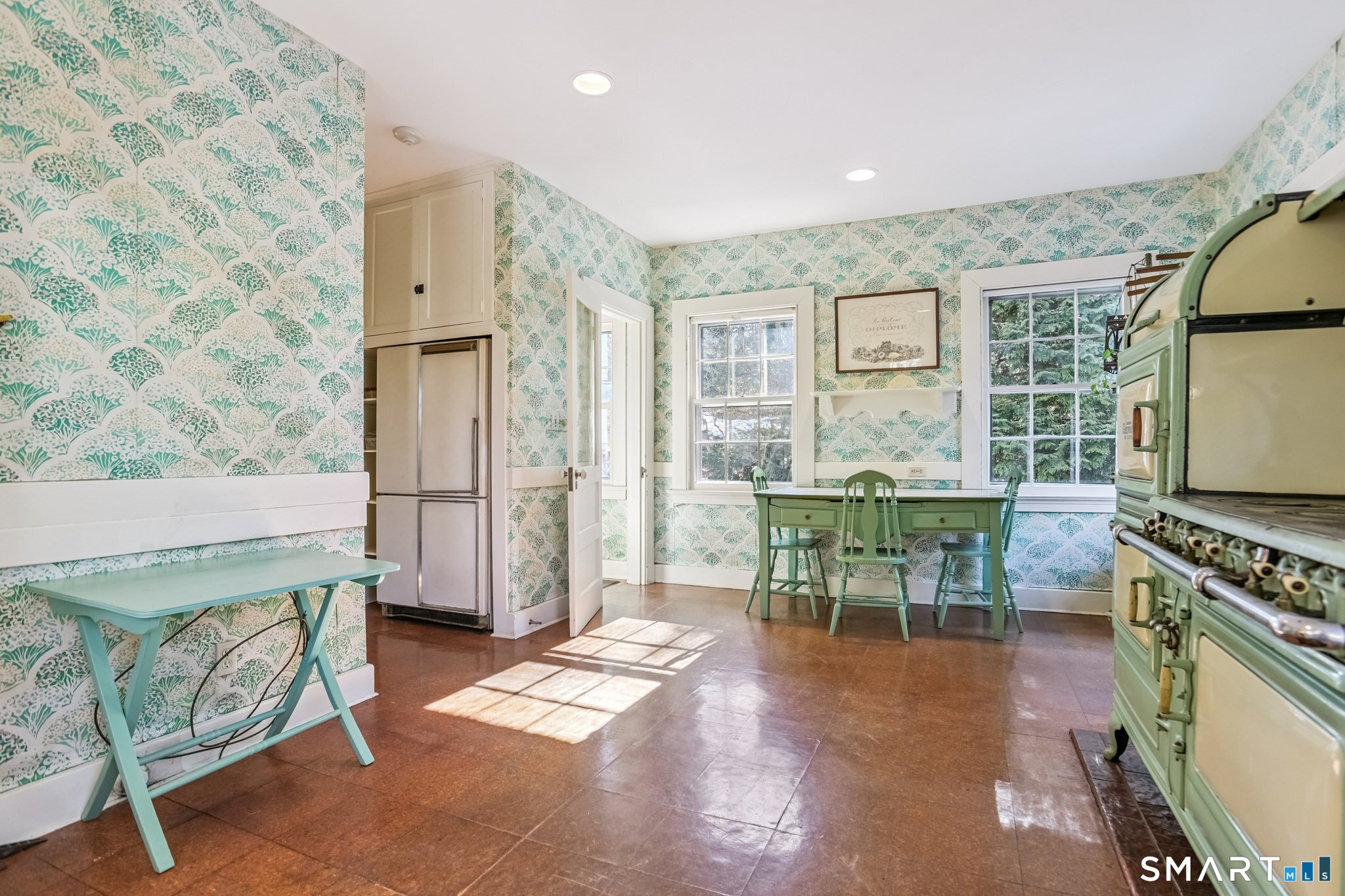 1050 Whitney Avenue Hamden, CT 06517 - Photo 22 of 40 a dining room with furniture and wooden floor