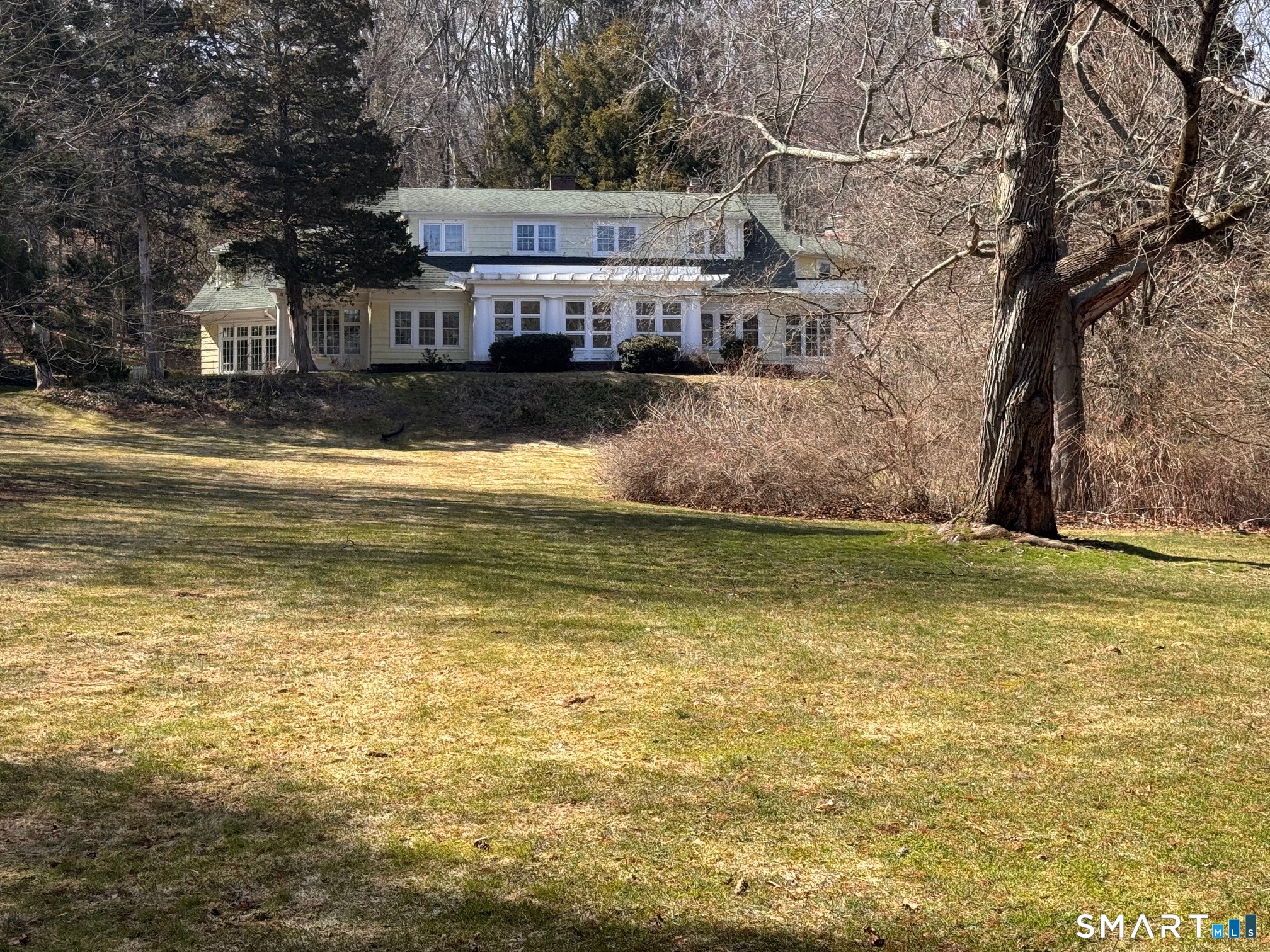 1050 Whitney Avenue Hamden, CT 06517 - Photo 3 of 40 a view of a house with a yard