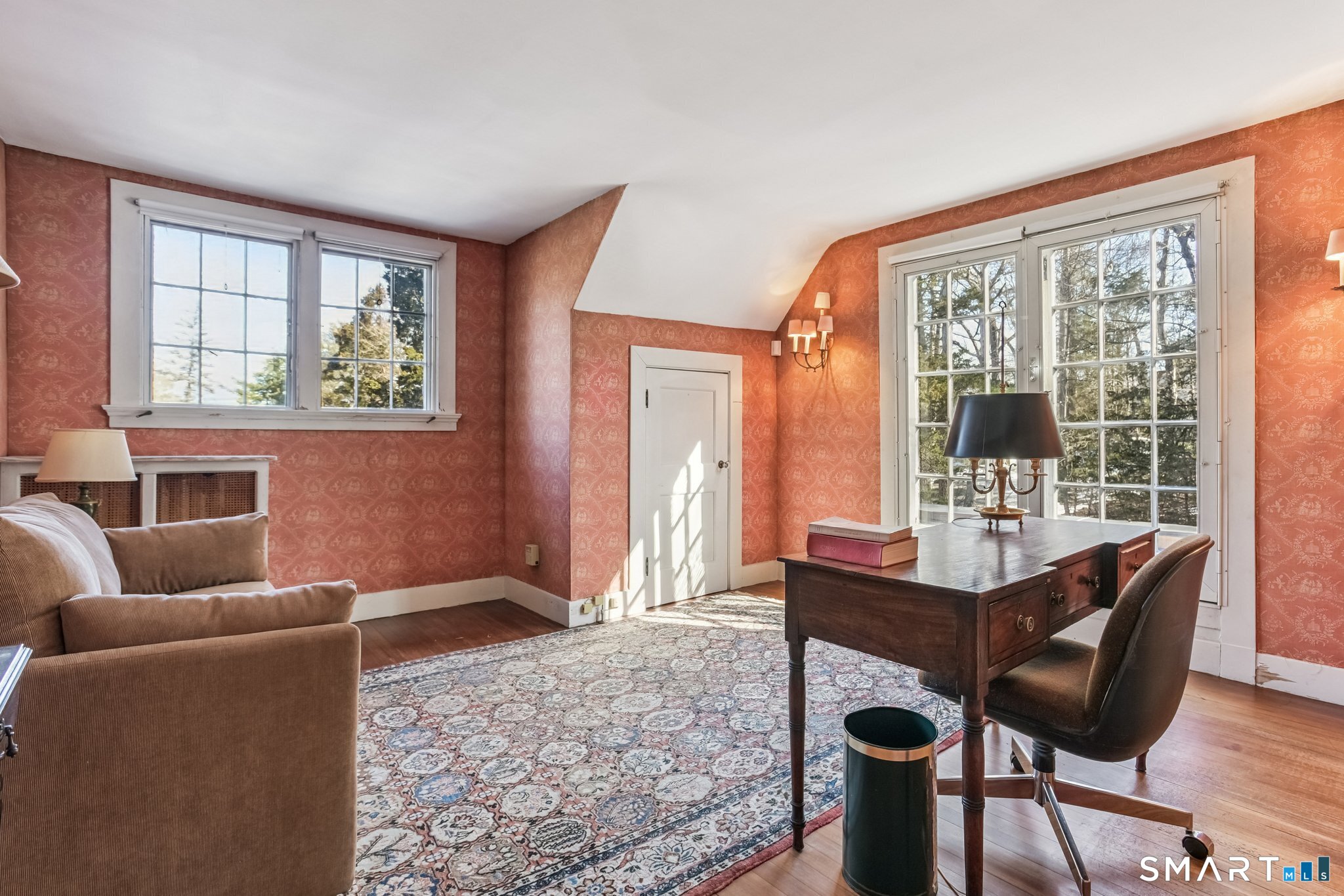 1050 Whitney Avenue Hamden, CT 06517 - Photo 35 of 40 a living room with furniture and a window