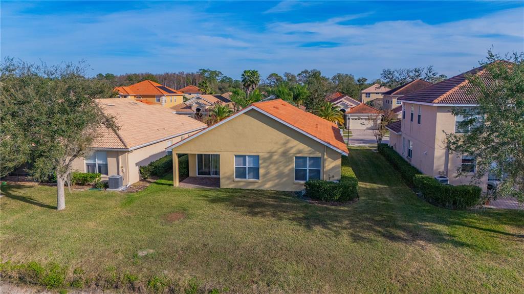 18028 Java Isle Drive Tampa, FL 33647 - Photo 11 of 53 front view of a house with a yard
