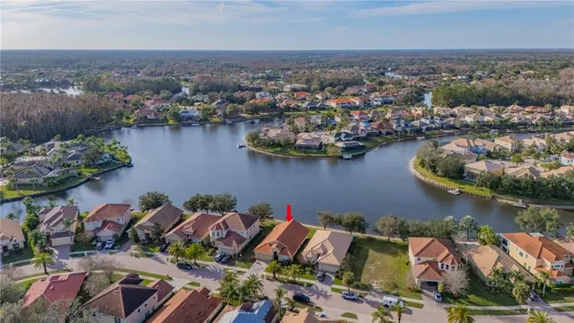 an aerial view of a house with outdoor space