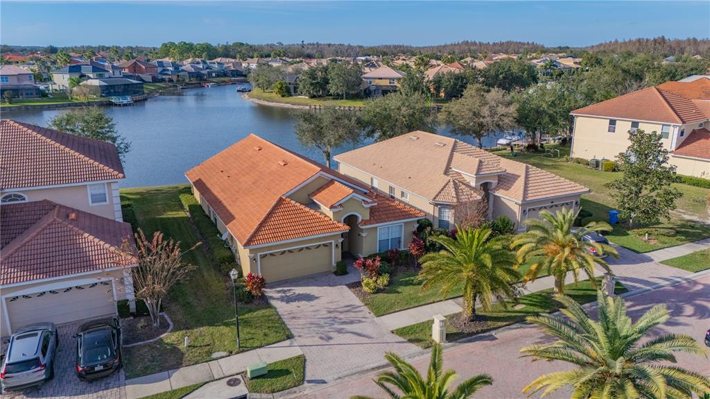 18028 Java Isle Drive Tampa, FL 33647 - Photo 5 of 53 an aerial view of house with yard and lake view