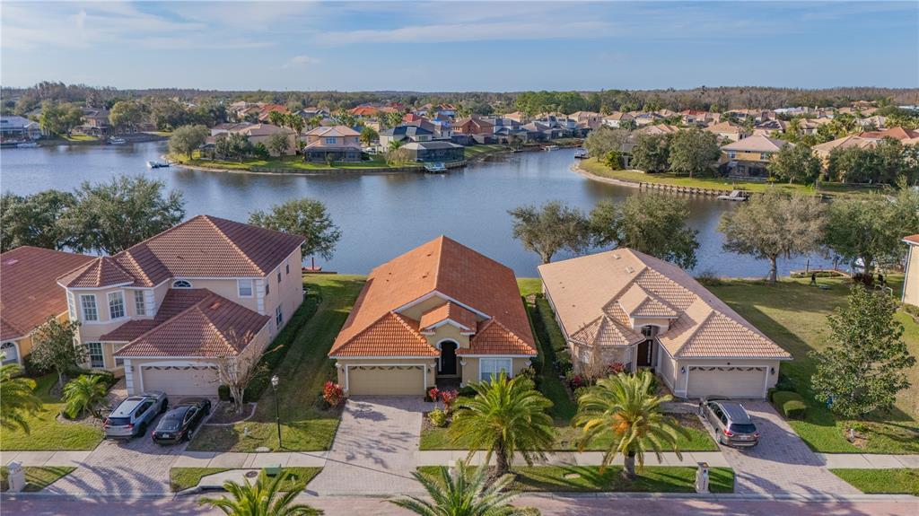 18028 Java Isle Drive Tampa, FL 33647 - Photo 6 of 53 an aerial view of house with yard lake and lake view