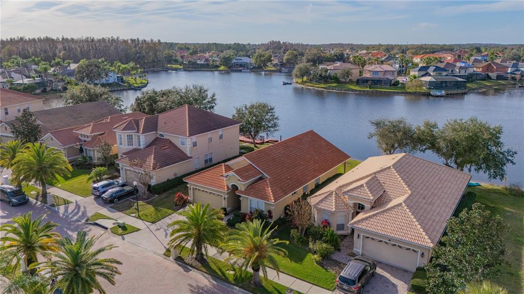 18028 Java Isle Drive Tampa, FL 33647 - Photo 7 of 53 an aerial view of a house with outdoor space and lake view