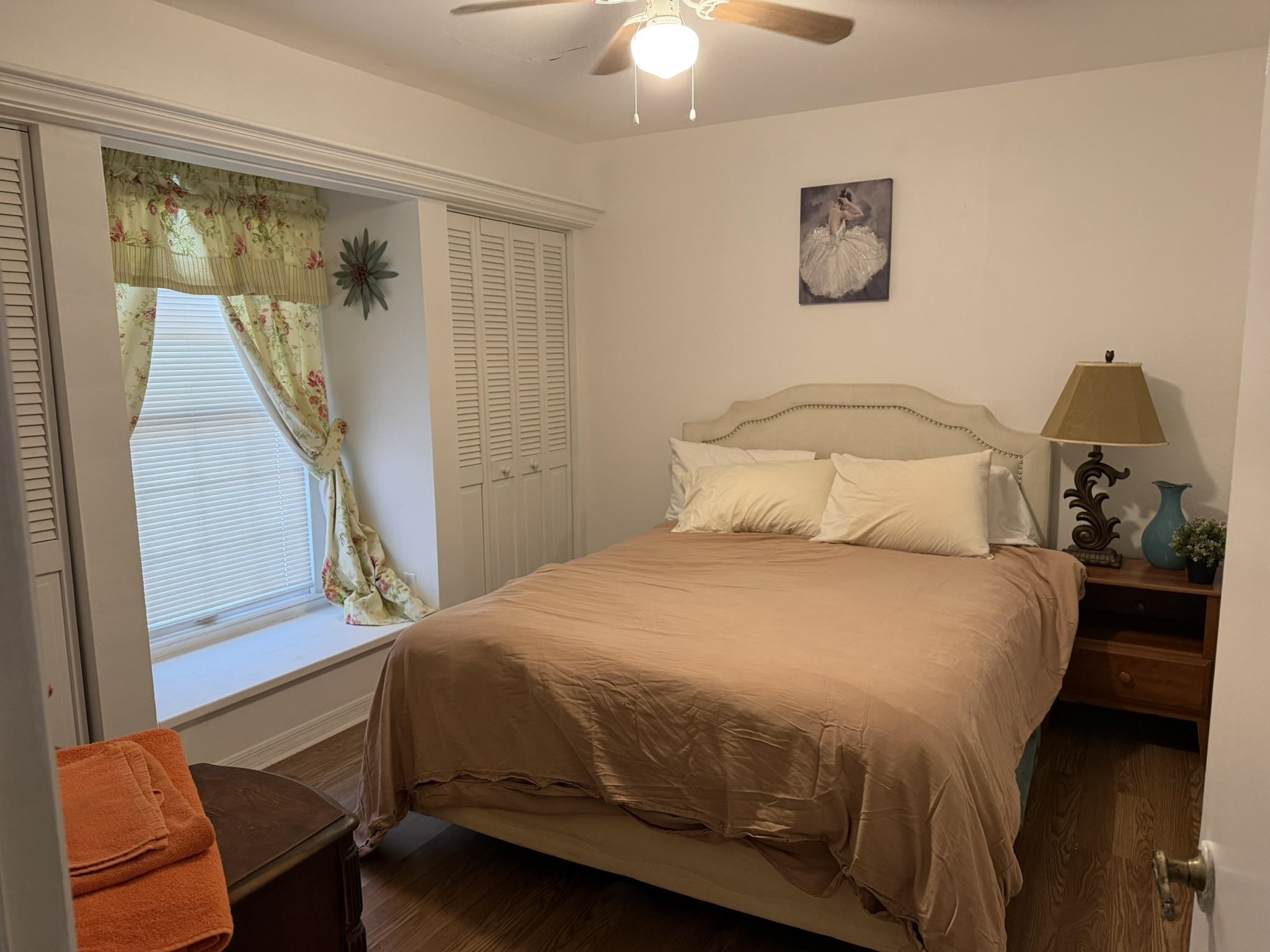 404 Fifteenth Street St. Augustine, FL 32084 - Photo 15 of 23 a bedroom with a bed and a chandelier