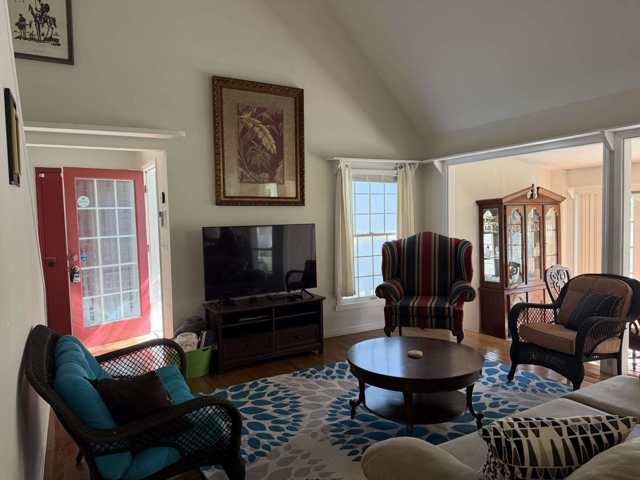 404 Fifteenth Street St. Augustine, FL 32084 - Photo 20 of 23 a living room with furniture and a flat screen tv
