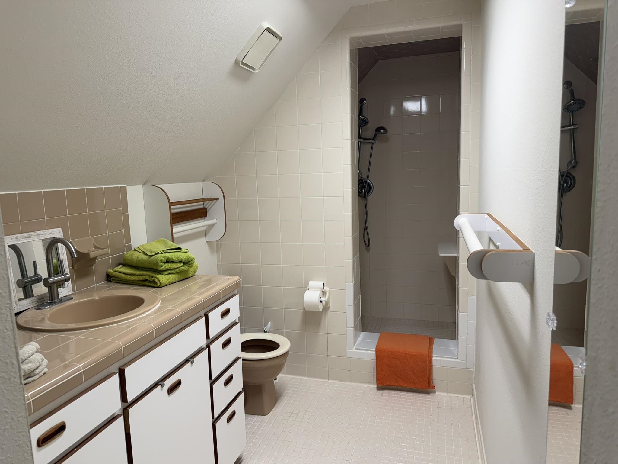 404 Fifteenth Street St. Augustine, FL 32084 - Photo 22 of 23 a bathroom with a sink and a mirror