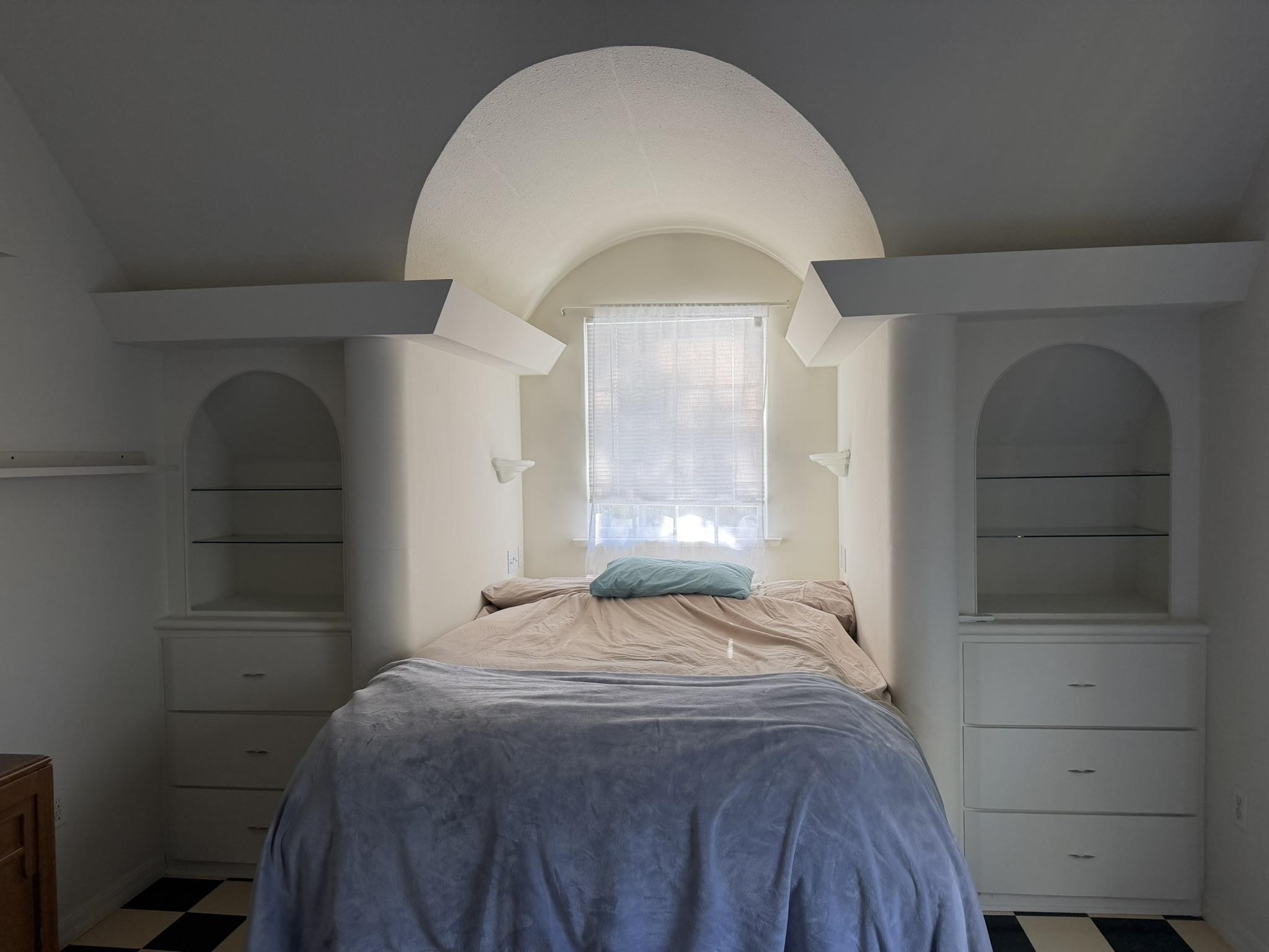 404 Fifteenth Street St. Augustine, FL 32084 - Photo 23 of 23 a bedroom with a bed and a window