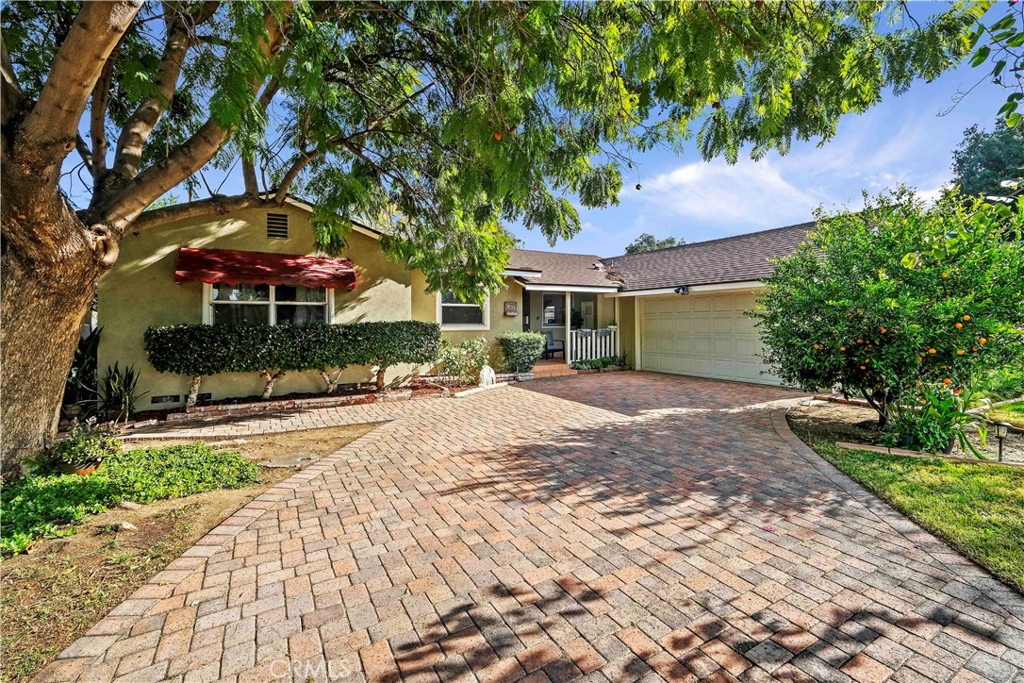 3655 Crowell Avenue Riverside, CA 92504 - Photo 1 of 1 a front view of a house with a yard and trees
