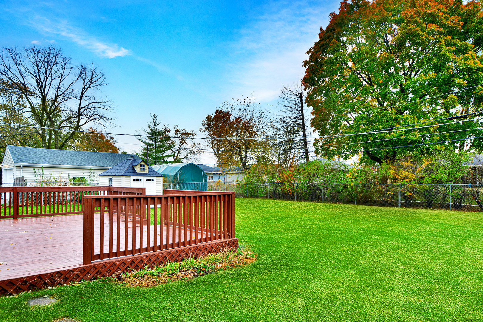 16 Northcrest Road Lake Zurich, IL 60047 - Photo 27 of 29 a view of a deck with a big yard and large trees