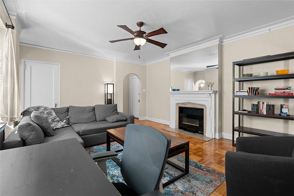 166 North Dithridge Street, Unit 1E Pittsburgh, PA 15213 - Photo 11 of 31 a living room with furniture or fireplace and a window