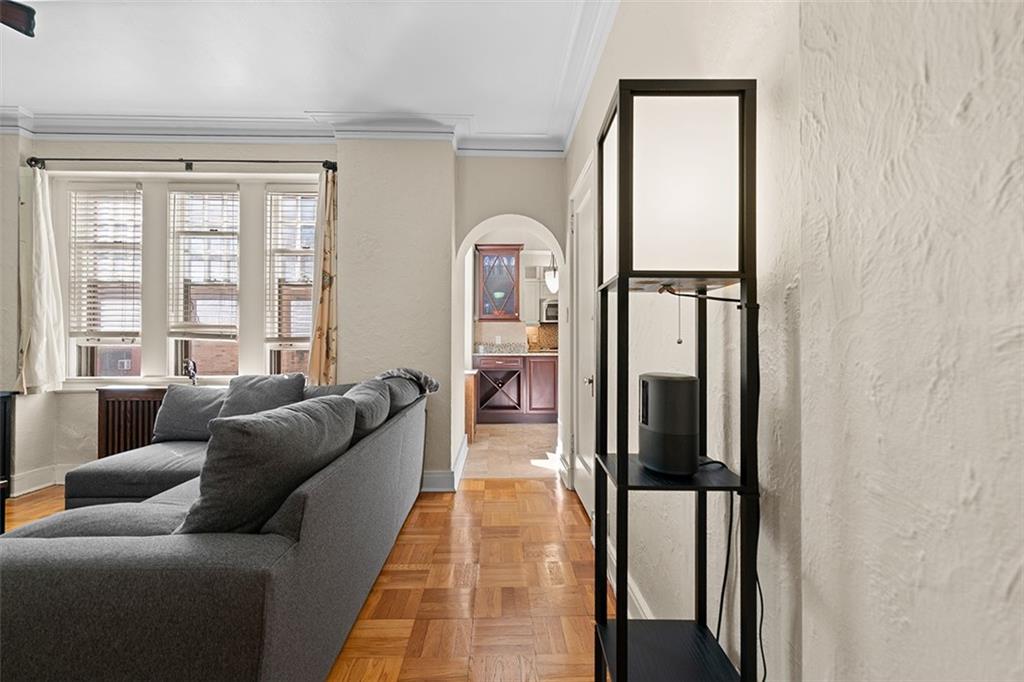 166 North Dithridge Street, Unit 1E Pittsburgh, PA 15213 - Photo 13 of 31 a living room with furniture and a window