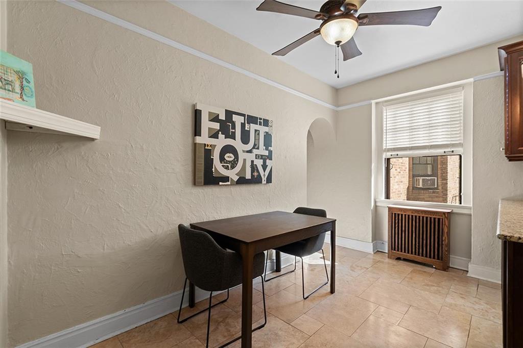 166 North Dithridge Street, Unit 1E Pittsburgh, PA 15213 - Photo 14 of 31 a view of a workspace with furniture and a window