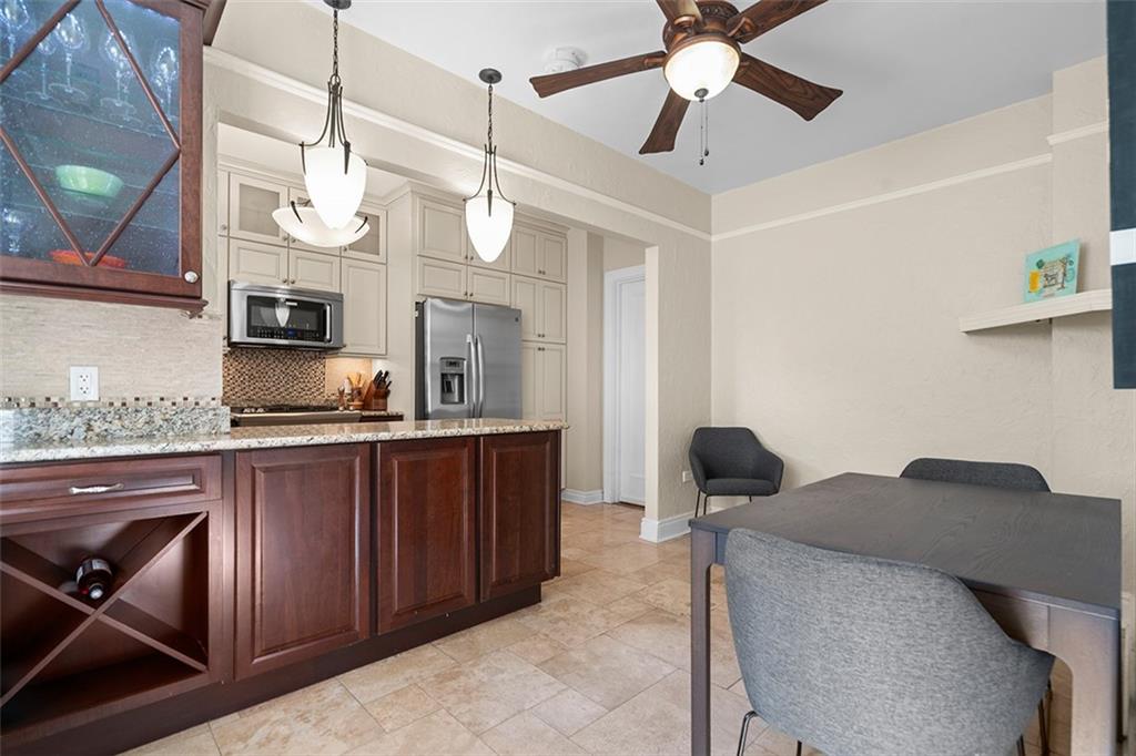 166 North Dithridge Street, Unit 1E Pittsburgh, PA 15213 - Photo 18 of 31 a kitchen with a sink cabinets and appliances