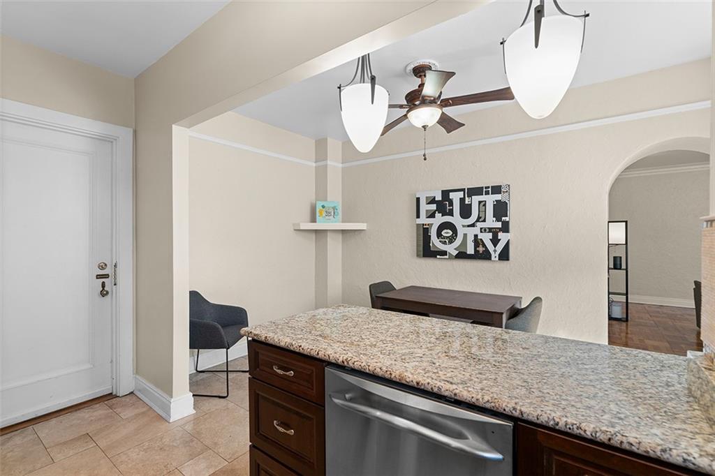 166 North Dithridge Street, Unit 1E Pittsburgh, PA 15213 - Photo 20 of 31 a kitchen with a counter and a view of living room