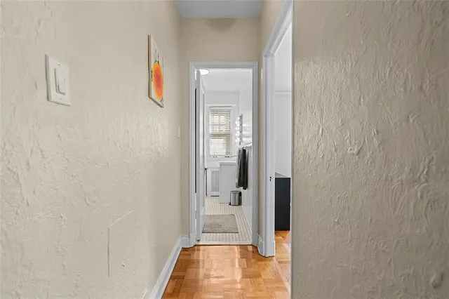 a view of a bathroom with a shower curtain