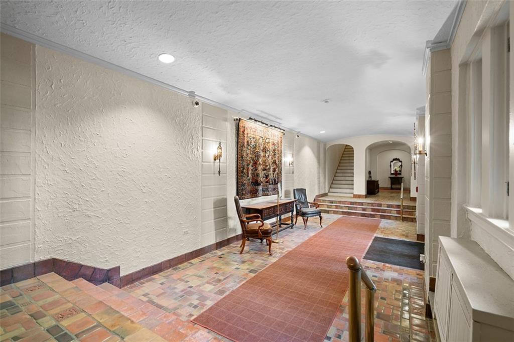 166 North Dithridge Street, Unit 1E Pittsburgh, PA 15213 - Photo 6 of 31 a living room with furniture and a window