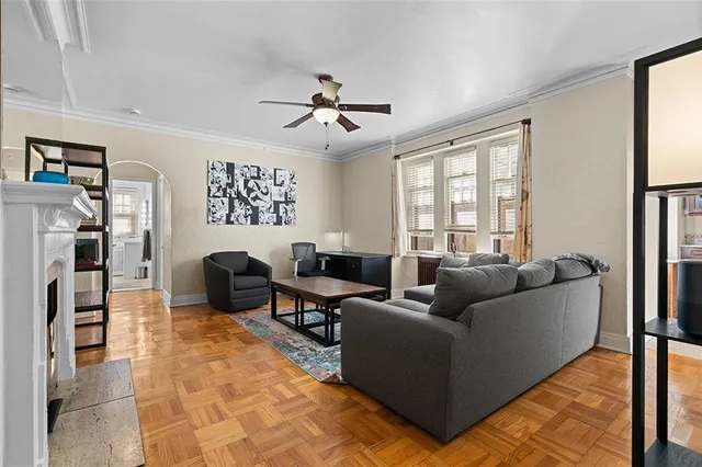a living room with furniture and a window