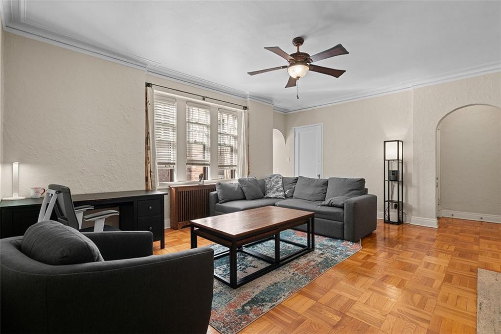 166 North Dithridge Street, Unit 1E Pittsburgh, PA 15213 - Photo 10 of 31 a living room with furniture and a window