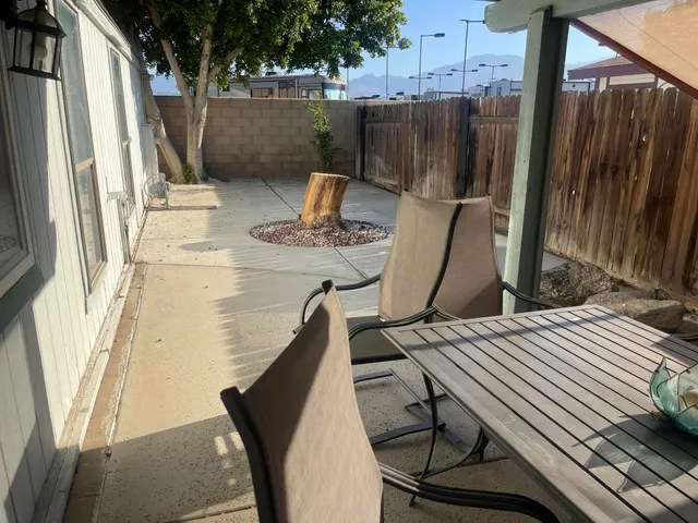 a view of balcony with furniture