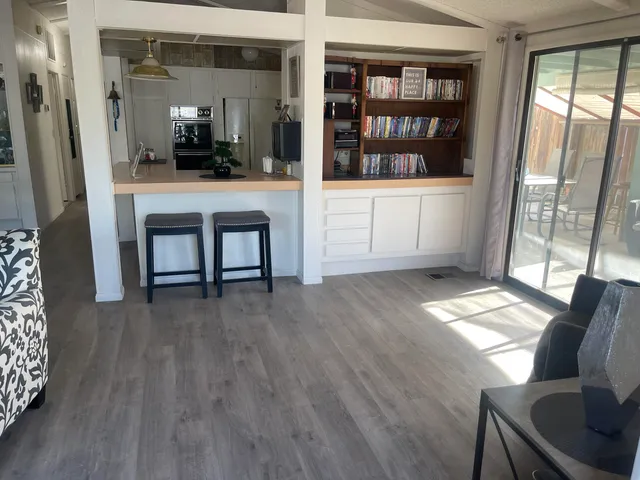a view of livingroom with furniture and window