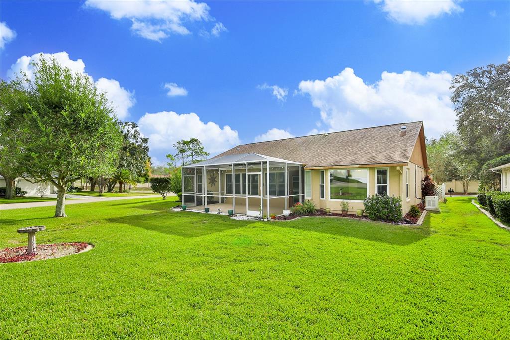 2181 Terrace View Lane Spring Hill, FL 34606 - Photo 46 of 60 a view of a house with a big yard