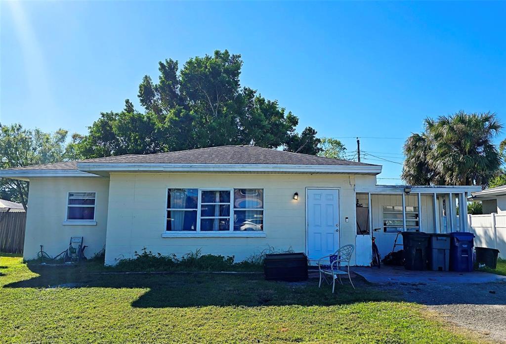 3310 Lexington Street Sarasota, FL 34231 - Photo 2 of 35 a view of a house with pool in front of it