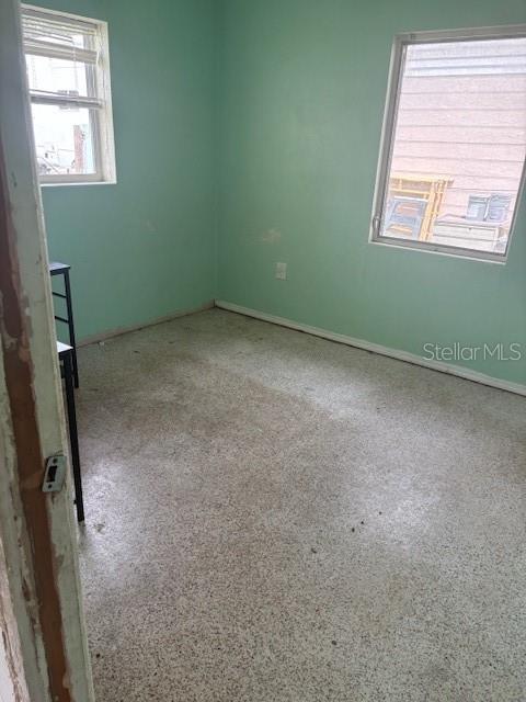 3310 Lexington Street Sarasota, FL 34231 - Photo 25 of 35 an empty room with a window