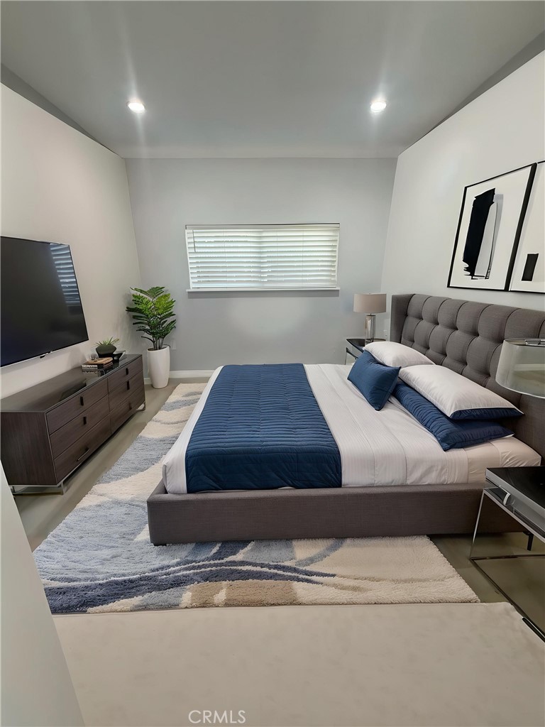 6504 Hesperia Avenue Reseda, CA 91335 - Photo 2 of 11 a living room with furniture and a flat screen tv