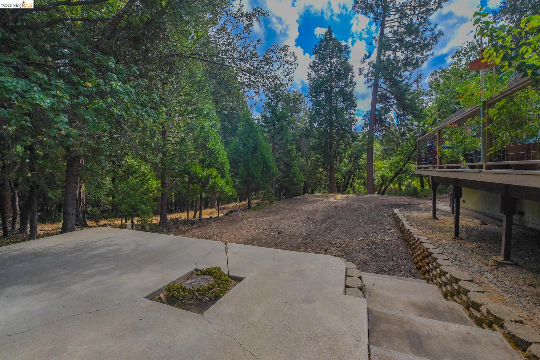 23615 Elizabeth Peak Road Twain Harte, CA 95383 - Photo 27 of 38 View of patio / terrace featuring driveway
