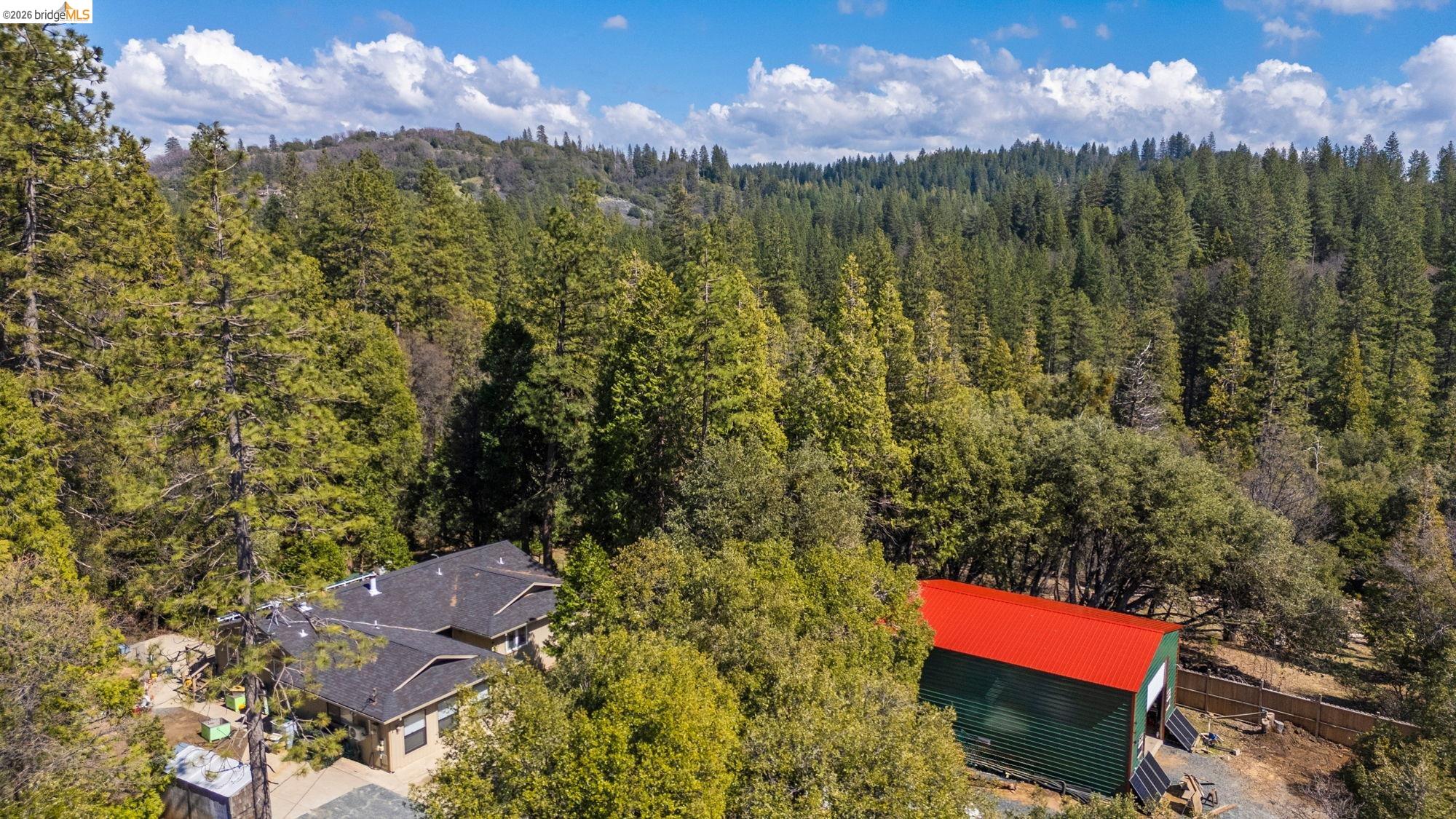 23615 Elizabeth Peak Road Twain Harte, CA 95383 - Photo 36 of 38 Drone / aerial view of a heavily wooded area