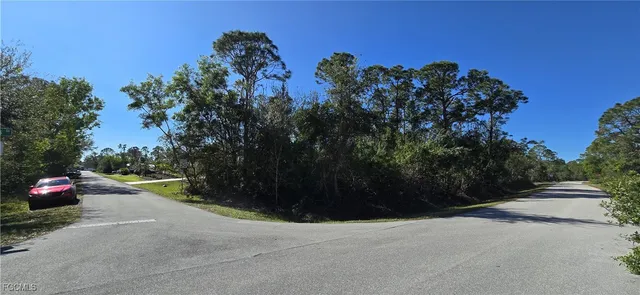 a view of street and small yard
