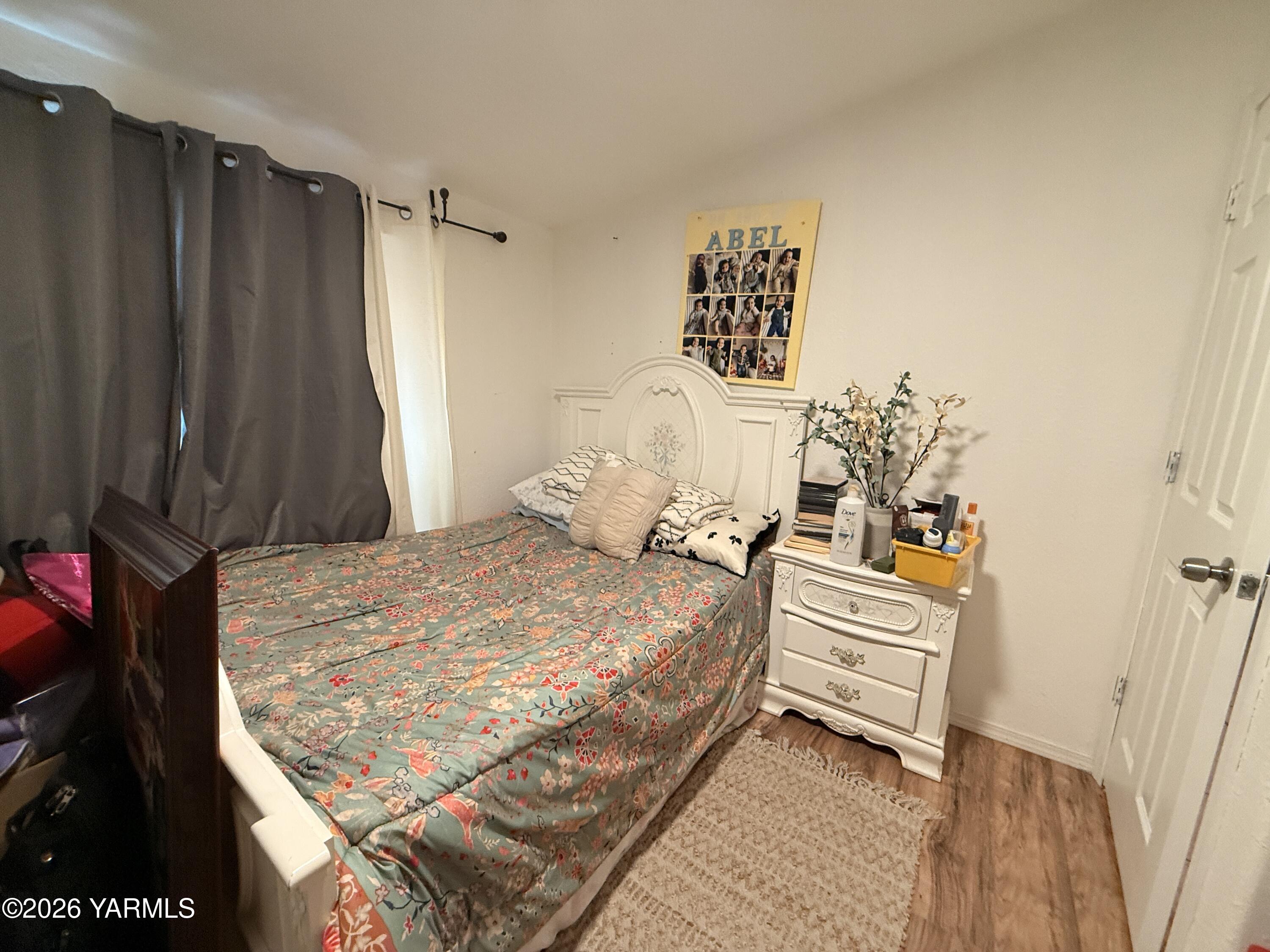 1051 County Line Mabton, WA 98935 - Photo 14 of 22 a bedroom with a bed and a table