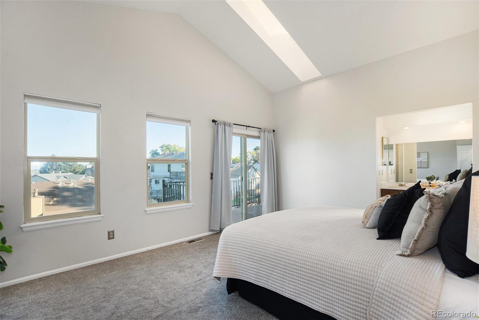 11820 Wyandot Circle Denver, CO 80234 - Photo 15 of 35 a bedroom with a bed and window