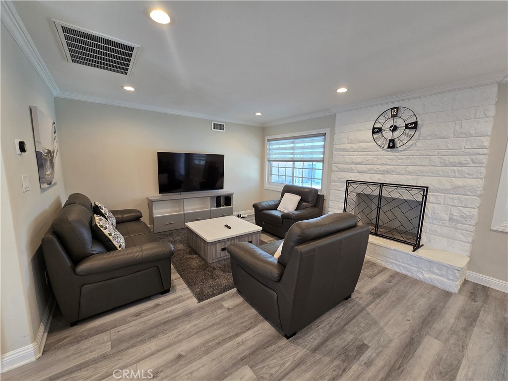 1925 South Kathy Lane Anaheim, CA 92802 - Photo 12 of 12 a living room with furniture and a flat screen tv