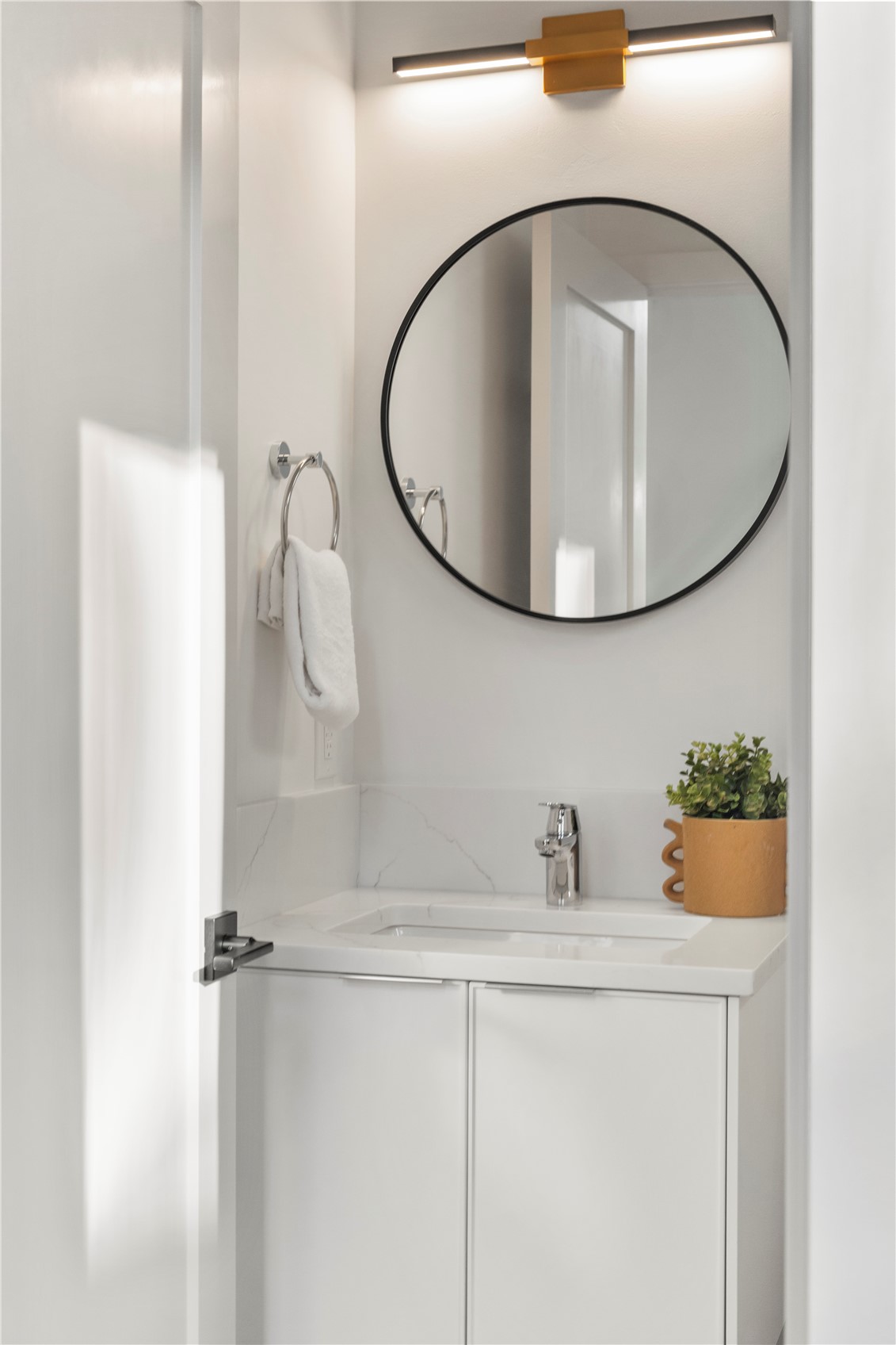 4121 B Chilberg Avenue Southwest Seattle, WA 98116 - Photo 11 of 29 a bathroom with a sink mirror and vanity