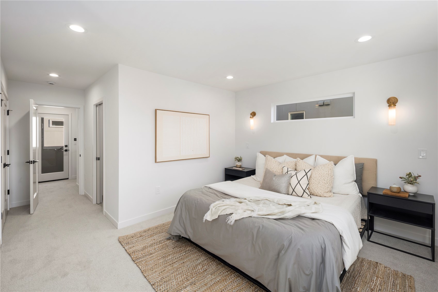 4121 B Chilberg Avenue Southwest Seattle, WA 98116 - Photo 13 of 29 a bedroom with a bed and a view