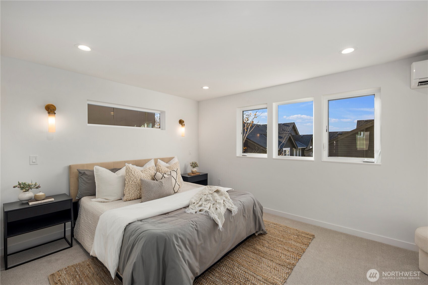 4121 B Chilberg Avenue Southwest Seattle, WA 98116 - Photo 15 of 29 a bedroom with a large bed and a window