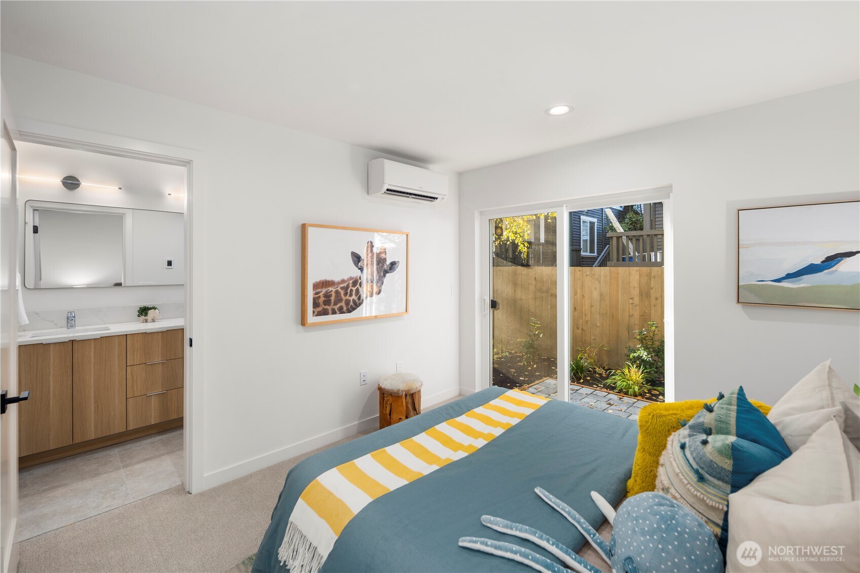 4121 B Chilberg Avenue Southwest Seattle, WA 98116 - Photo 20 of 29 a bedroom with furniture and a window