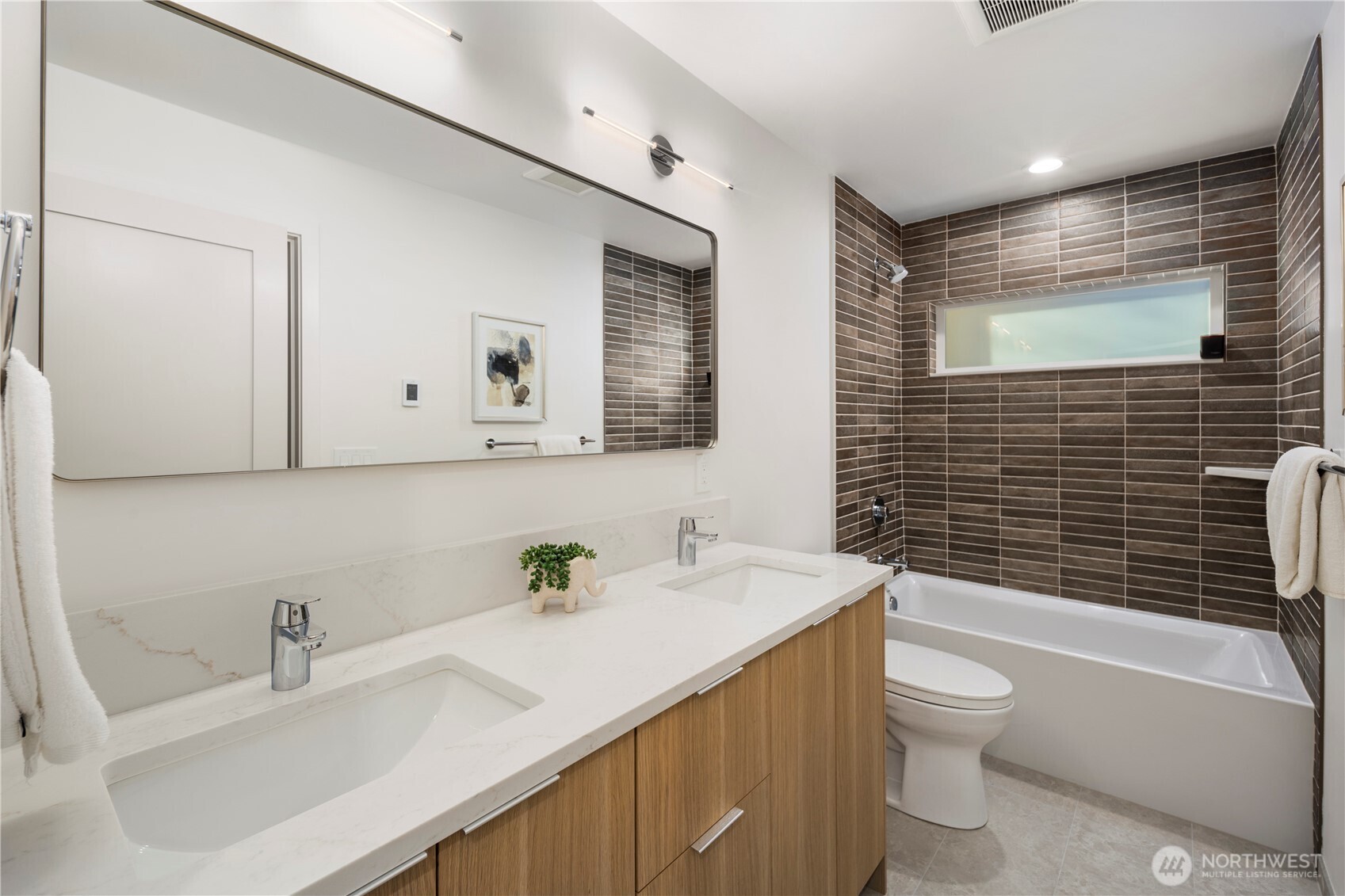 4121 B Chilberg Avenue Southwest Seattle, WA 98116 - Photo 21 of 29 a bathroom with a sink toilet and shower