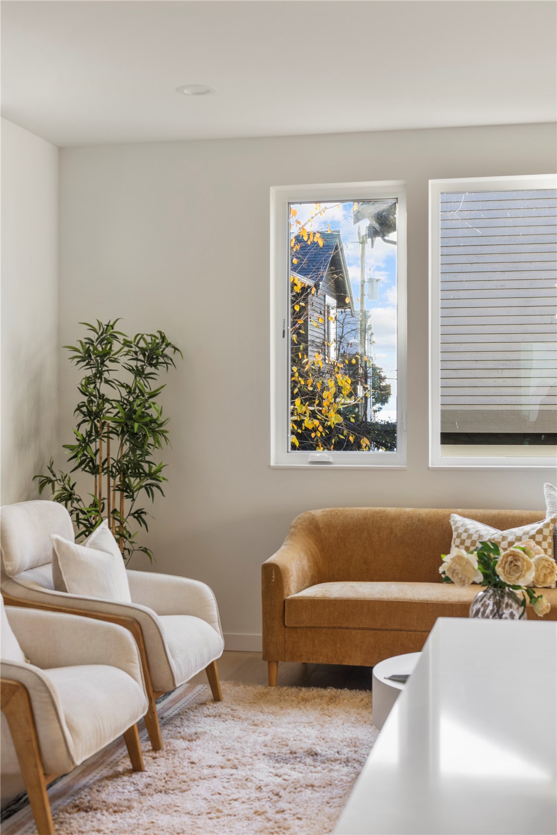 4121 B Chilberg Avenue Southwest Seattle, WA 98116 - Photo 10 of 29 a bedroom with a bed and a couch