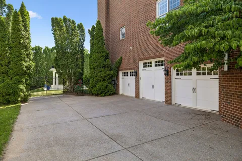 a view of a swimming pool with a yard
