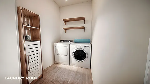 a view of a hallway with washer and dryer