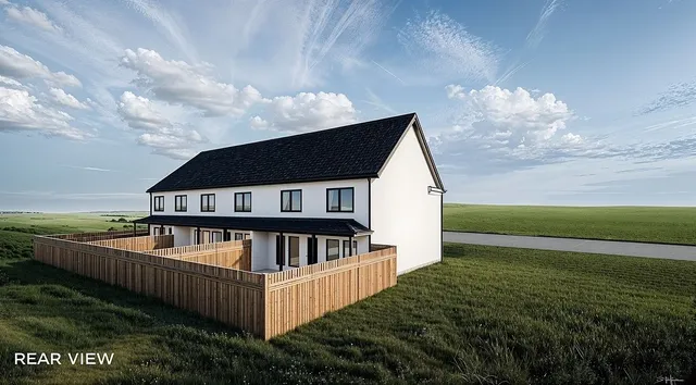 a view of house with roof deck